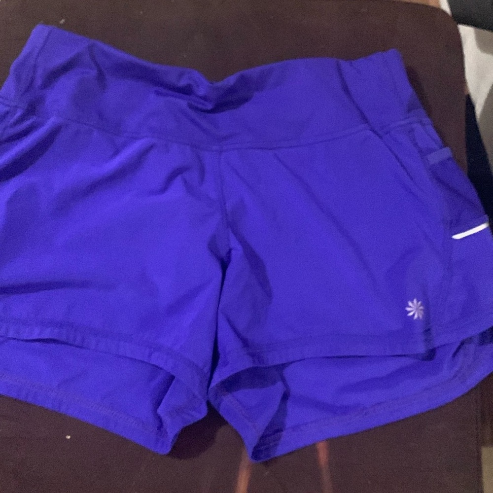Athleta running short will throw in an Athleta bag